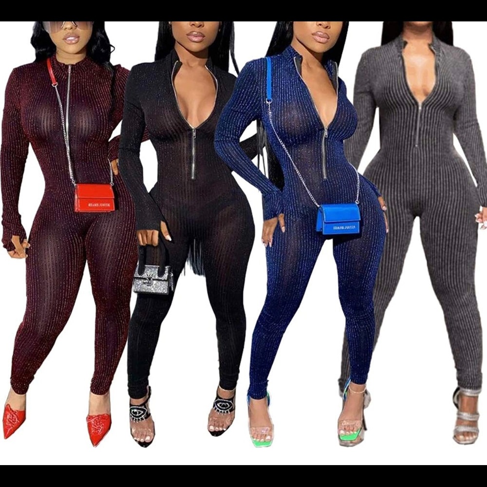 Jumpsuit is a shiny burgundy and black Shane Justin